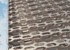 Perforerede og anodiserede aluminiumsplader fra RMIG brugt til facade på Audi udstillingsbygning