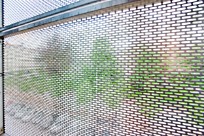 Perforated sun screens in stainless steel