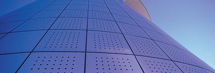 Perforated anodised aluminium sheets from RMIG used for facade