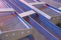 Perforated screens from RMIG used for fine channel screening escalators