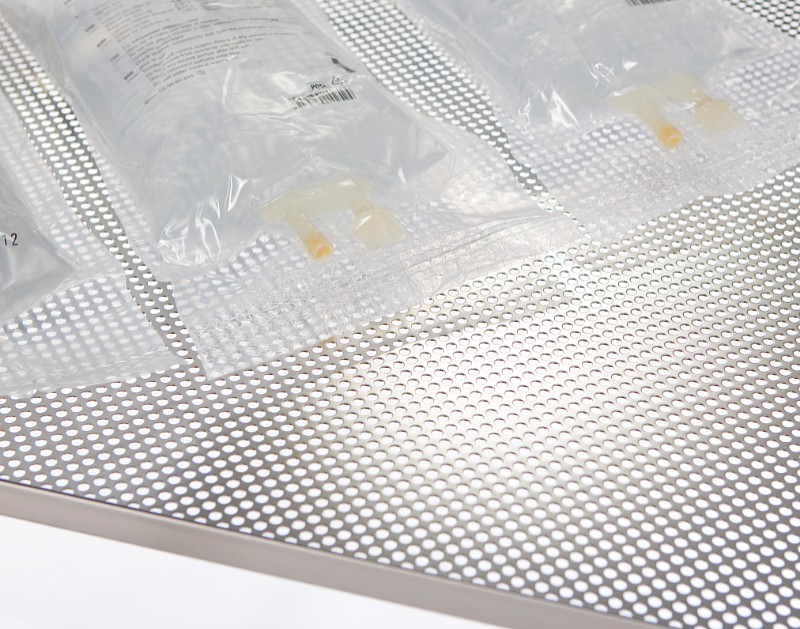 Perforated sterilizing tray